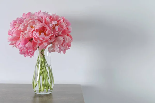Beautiful Bouquet Pink Peonies Vase Wooden Table White Background Space — Stock Photo, Image