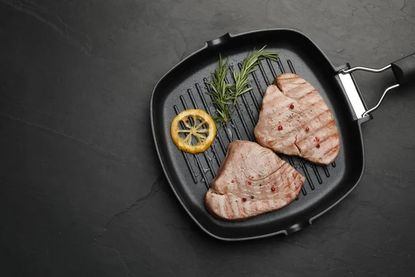 Delicious Tuna Steaks Lemon Rosemary Black Table Top View Space — Stock Photo, Image