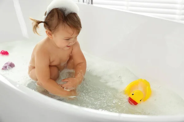 Cute Little Girl Taking Bubble Bath Toys Indoors Space Text — Stock Photo, Image