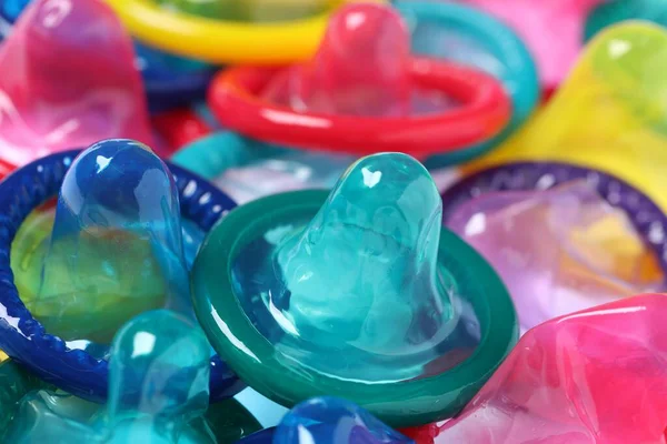 Coloridos Condones Desempaquetados Como Fondo Vista Cerca Sexo Seguro —  Fotos de Stock