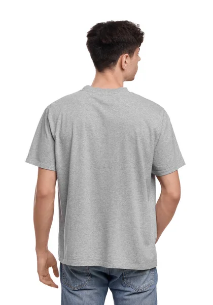 Hombre Joven Con Camiseta Gris Sobre Fondo Blanco Vista Trasera —  Fotos de Stock