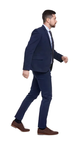 Beyaz Arka Planda Koşan Takım Elbiseli Yakışıklı Sakallı Adamı — Stok fotoğraf