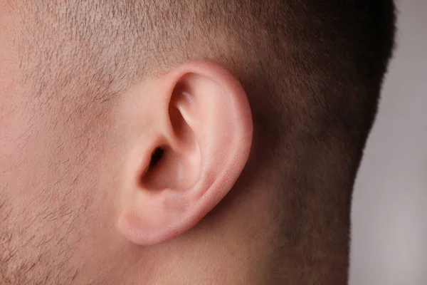 Man Grey Background Closeup Ear — Stockfoto