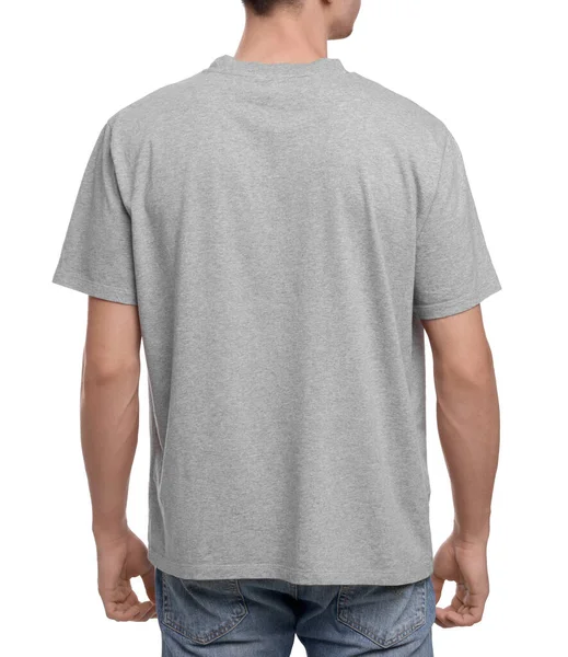 年轻男子穿着灰色T恤 背景为白色 后视镜 — 图库照片