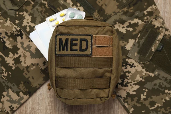 First Aid Kit Military Uniform Wooden Table Flat Lay — Stock Photo, Image