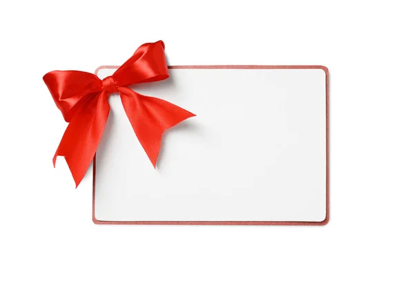 Cartão Presente Branco Com Arco Vermelho Isolado Branco Vista Superior — Fotografia de Stock