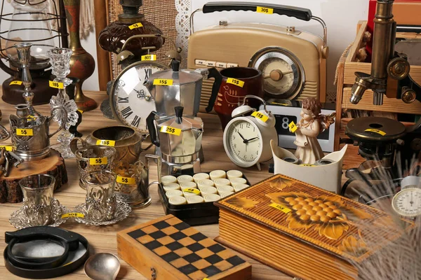 Many Different Items Wooden Table Garage Sale — Stock Photo, Image