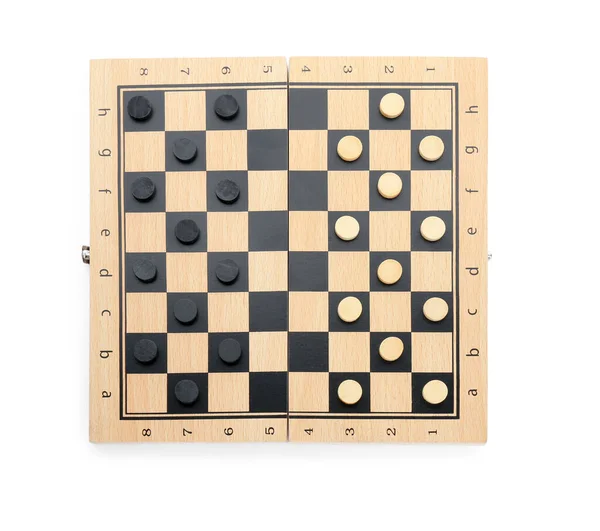 stock image Wooden checkerboard with game pieces isolated on white, top view