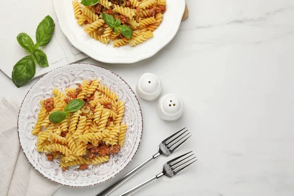 Delicious Pasta Minced Meat Basil Served White Marble Table Flat — Stock Photo, Image