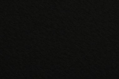 Arkaplan olarak siyah kağıt yaprağının dokusu, üst görünüm