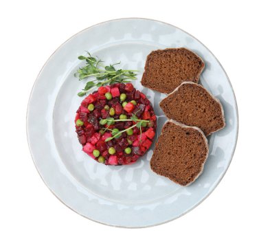 Beyaz üzerine izole edilmiş ekmek dilimleri ile nefis sirkeli salata.