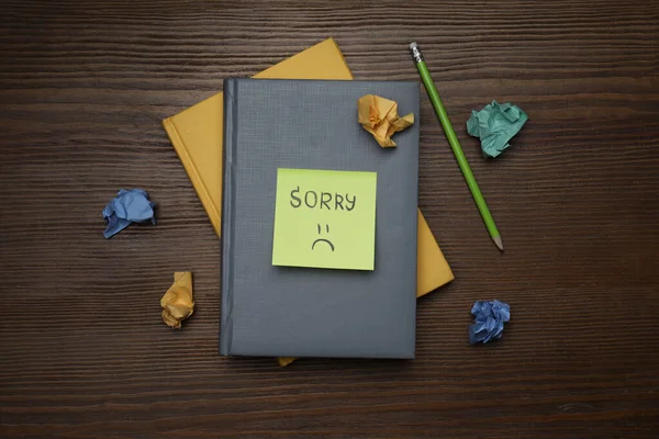 Apology Sticky Paper Word Sorry Drawn Sad Face Notebooks Pencil — Stock Photo, Image