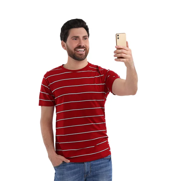 笑顔男取ります自画撮りとともにスマートフォン上の白い背景 — ストック写真