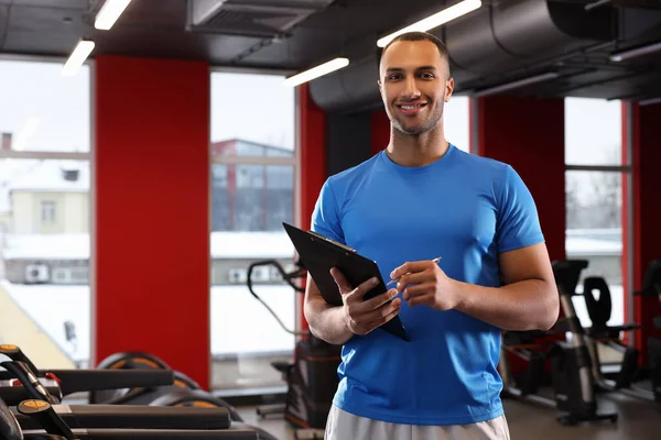 Happy Trainer Writing Workout Plan Modern Gym Space Text — Stok fotoğraf
