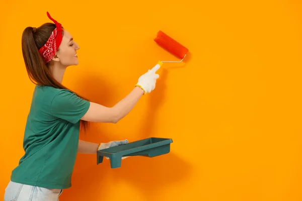 Designer Painting Orange Wall Roller Space Text — Foto de Stock