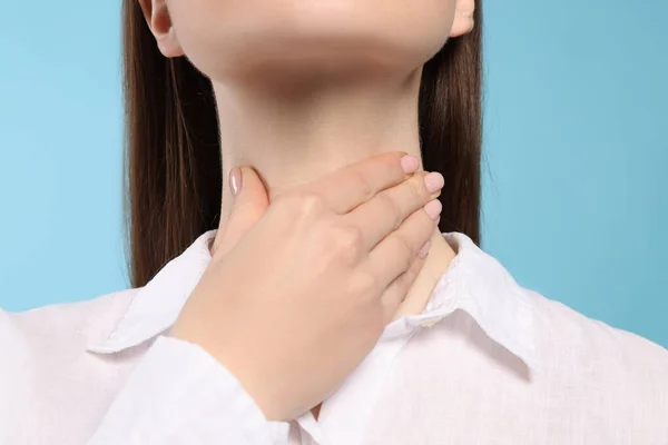 Woman Sore Throat Light Blue Background Closeup — Stock Photo, Image