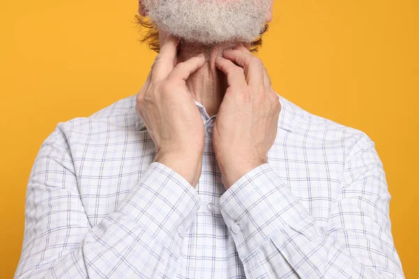 Senior Man Suffering Sore Throat Yellow Background Closeup Cold Symptoms — Stock Photo, Image