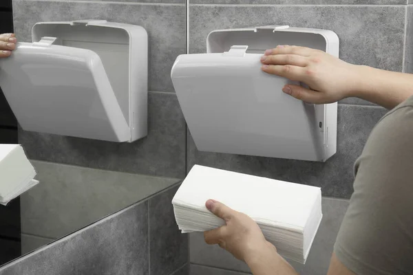 Woman Putting New Fresh Paper Towels Dispenser Bathroom Closeup — Stock Photo, Image