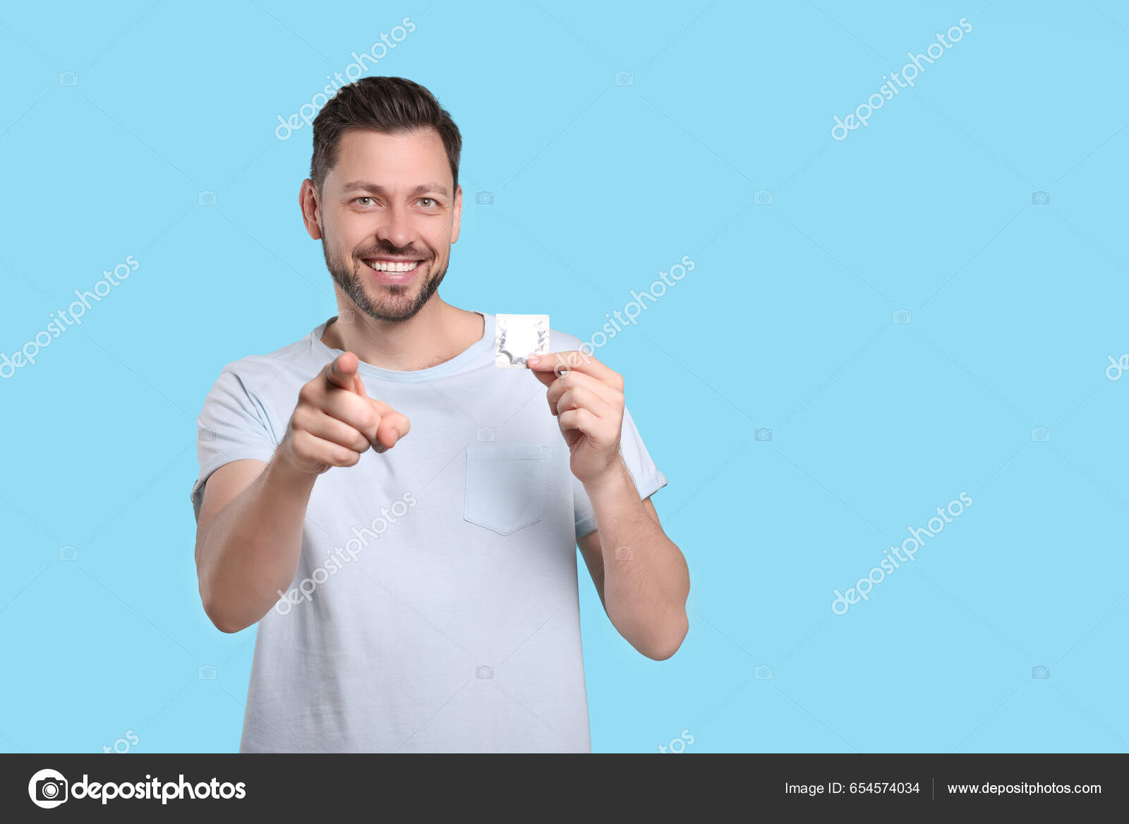 Happy Man Holding Condom Light Blue Background Space Text Stock.