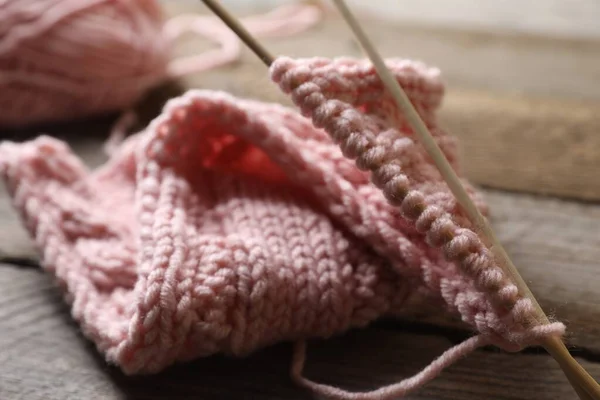 Pink Knitting Needles Wooden Table Closeup — Stock Photo, Image