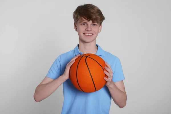 Teenage Boy Basketball Ball Light Grey Background — 图库照片