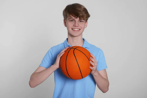 Teenage Boy Basketball Ball Light Grey Background — Φωτογραφία Αρχείου