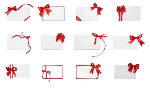 Set Many Different Gift Cards Red Bows White Background Felülnézet — Stock Fotó