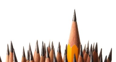 Many sharp graphite pencils isolated on white