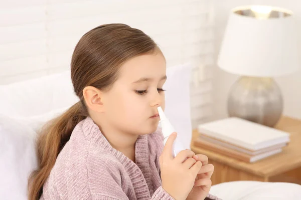 Little Girl Using Nasal Spray Bedroom — Stock Photo, Image