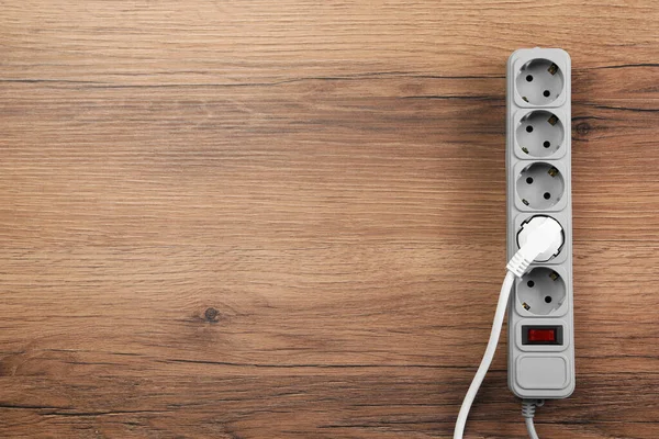 Power Strip Extension Cord Wooden Floor Top View Space Text — Stock Photo, Image