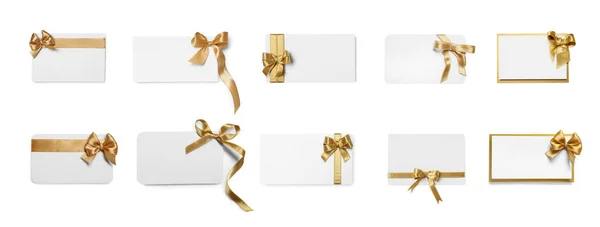 Набір Різних Подарункових Карток Золотими Бантами Білому Тлі Вид Зверху — стокове фото