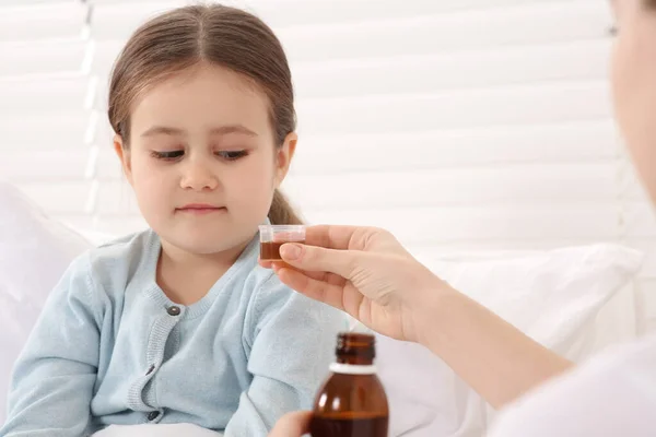 Mother Giving Cough Syrup Her Daughter Bedroom — Stock Photo, Image