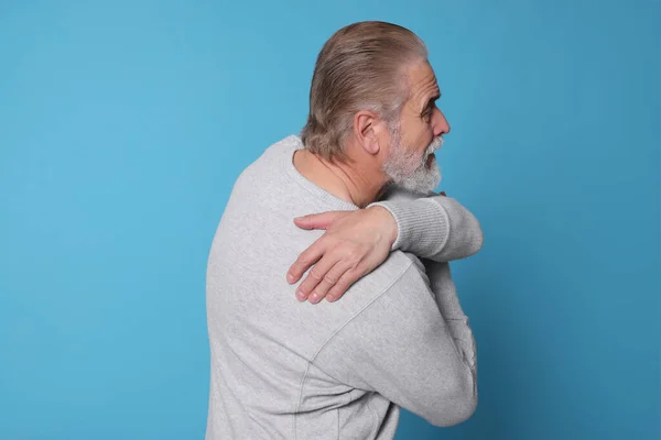 Senior Man Suffering Pain Back Light Blue Background Arthritis Symptoms — Stock Photo, Image