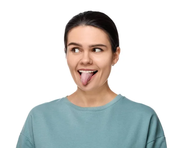 Dilini Beyaz Arka Planda Gösteren Mutlu Genç Bir Kadın — Stok fotoğraf