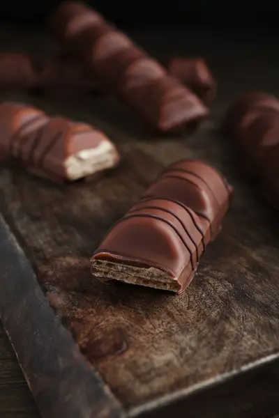 Tasty Chocolate Bars Wooden Board Closeup — Foto Stock