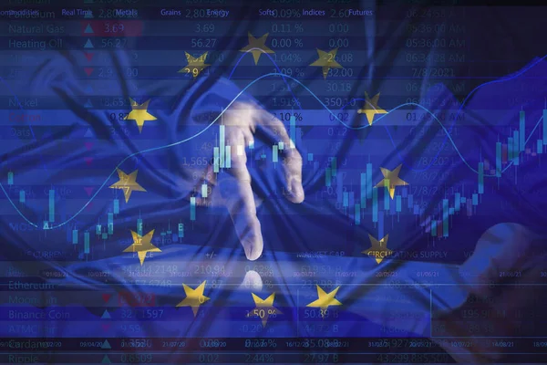 Stock exchange. Multiple exposure with European flag, data, graph and man using tablet
