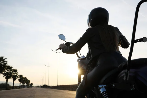 Woman Helmet Riding Motorcycle Sunset Back View Space Text — Stock Photo, Image