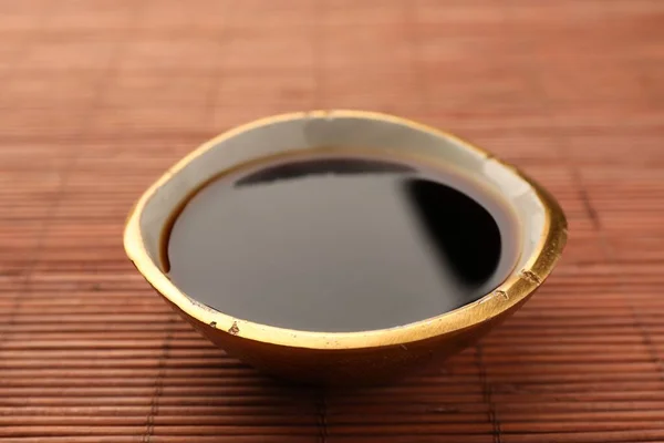 Bowl Soy Sauce Bamboo Mat Closeup — Stock Photo, Image