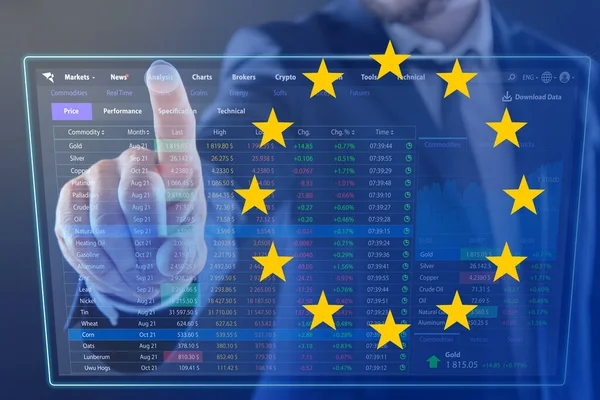Stock exchange. Double exposure with European flag and man using digital screen with trading data
