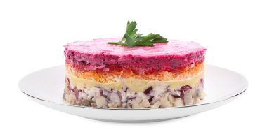 Herring under fur coat salad isolated on white. Traditional Russian dish