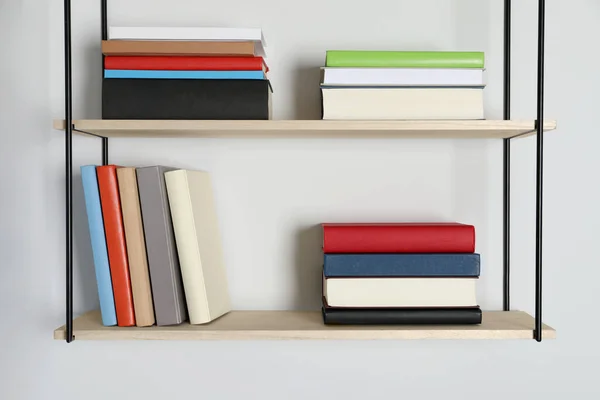 Shelves Many Hardcover Books White Wall — Stock Photo, Image