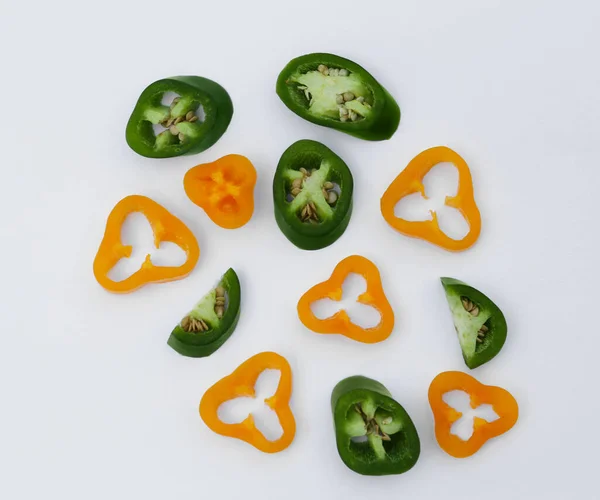 Different Cut Hot Chili Peppers White Background Flat Lay — Fotografia de Stock