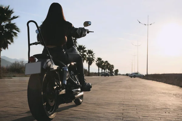 Woman Riding Motorcycle Sunset Back View Space Text — Stock Photo, Image