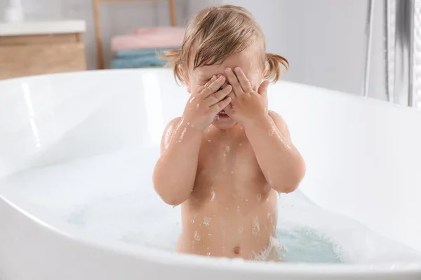 Playful Little Girl Covering Face While Taking Foamy Bath Home — Stock Photo, Image