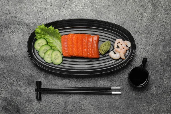 Tasty Salmon Slices Shrimp Cucumber Lettuce Grey Table Flat Lay — Stock Photo, Image