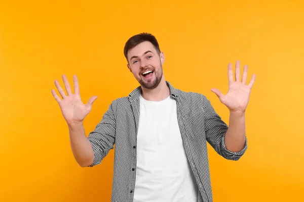 Man Giving High Five Both Hands Yellow Background — Stock Photo, Image