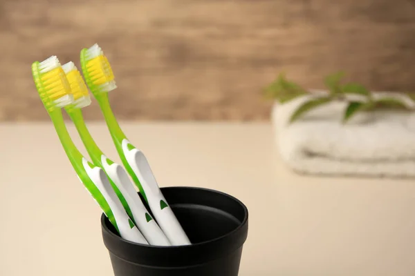Toothbrushes Holder Blurred Background Closeup Space Text — Stock Photo, Image