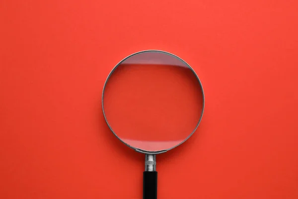 Magnifying Glass Red Background Top View — Stock Photo, Image