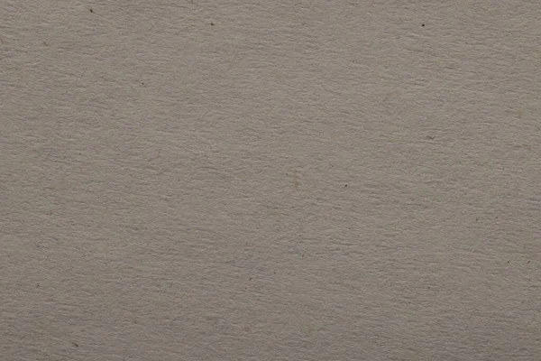 背景としての薄い灰色の紙シートの質感 トップビュー — ストック写真