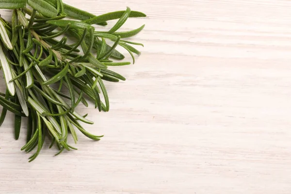 Fresh Green Rosemary White Wooden Table Top View Space Text — Stock Photo, Image